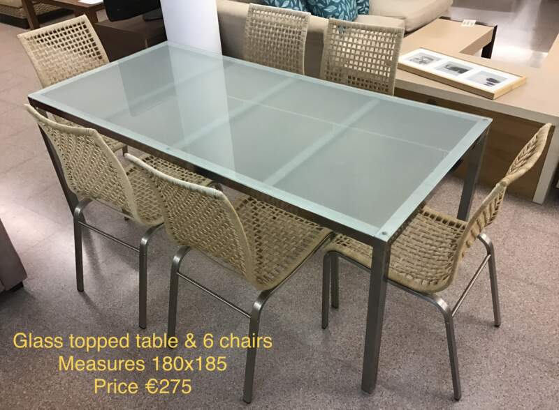 Glass topped table & 6 chairs