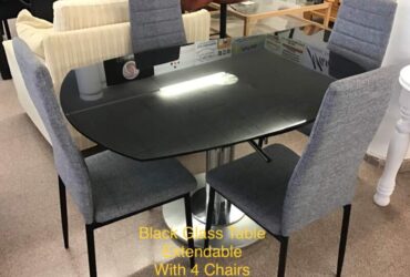 Black Glass Topped Table & 4 Chairs