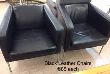 Two Black Leather Chairs