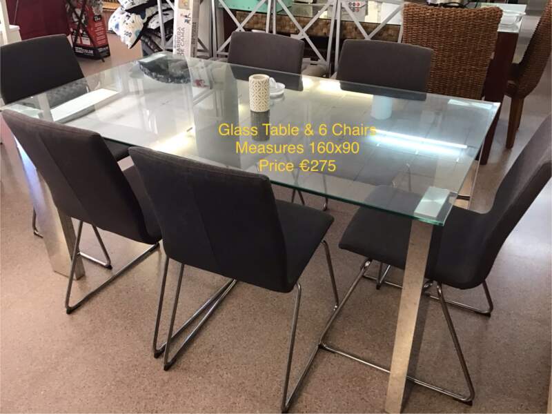 Glass Dining Table & 6 Chairs.